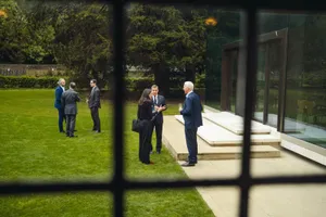 Conversation in the garden of Rhodes House, lill Global Symposium 2026, Rhodes House, Oxford